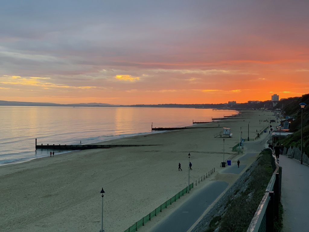 Sunset at Boscombe and Bournemouth in the distance