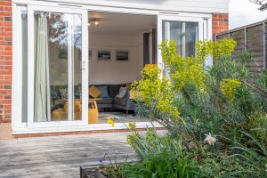 Holiday accommodation garden & sitting room